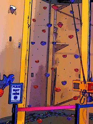 The image shows a rock climbing wall with colorful holds, a safety sign, and a cutout figure holding a wrench, all in a cartoonish style.