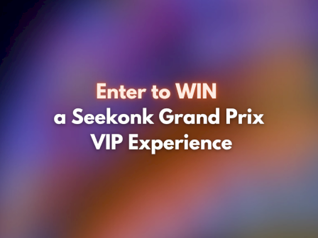 A blurred colorful background with white and orange text: &ldquo;Enter to WIN a Seekonk Grand Prix VIP Experience.&rdquo;